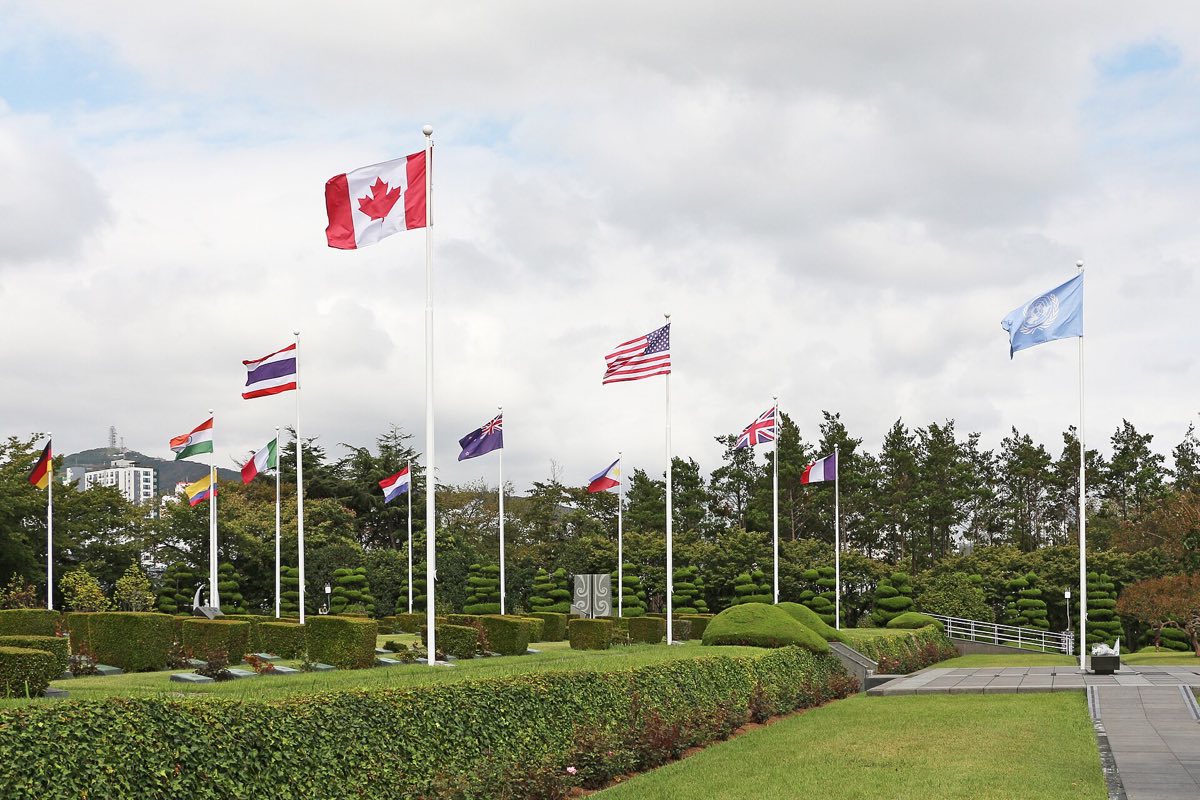 National flags over the lawns of the UN Memorial Cemetery in Busan