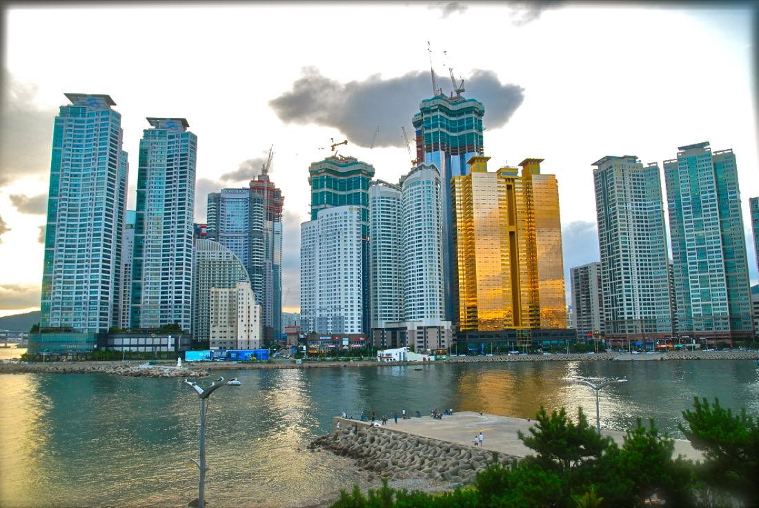 The towers of Haeundae catching golden light above the beach, Busan